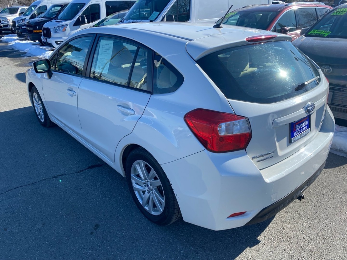 2016 WHITE SUBARU IMPREZA PREMIUM (JF1GPAB64G8) with an 2.0L engine, Continuously Variable transmission, located at 929 East 8th Ave, Anchorage, AK, 99501, (907) 274-2277, 61.214783, -149.866074- Photo#2