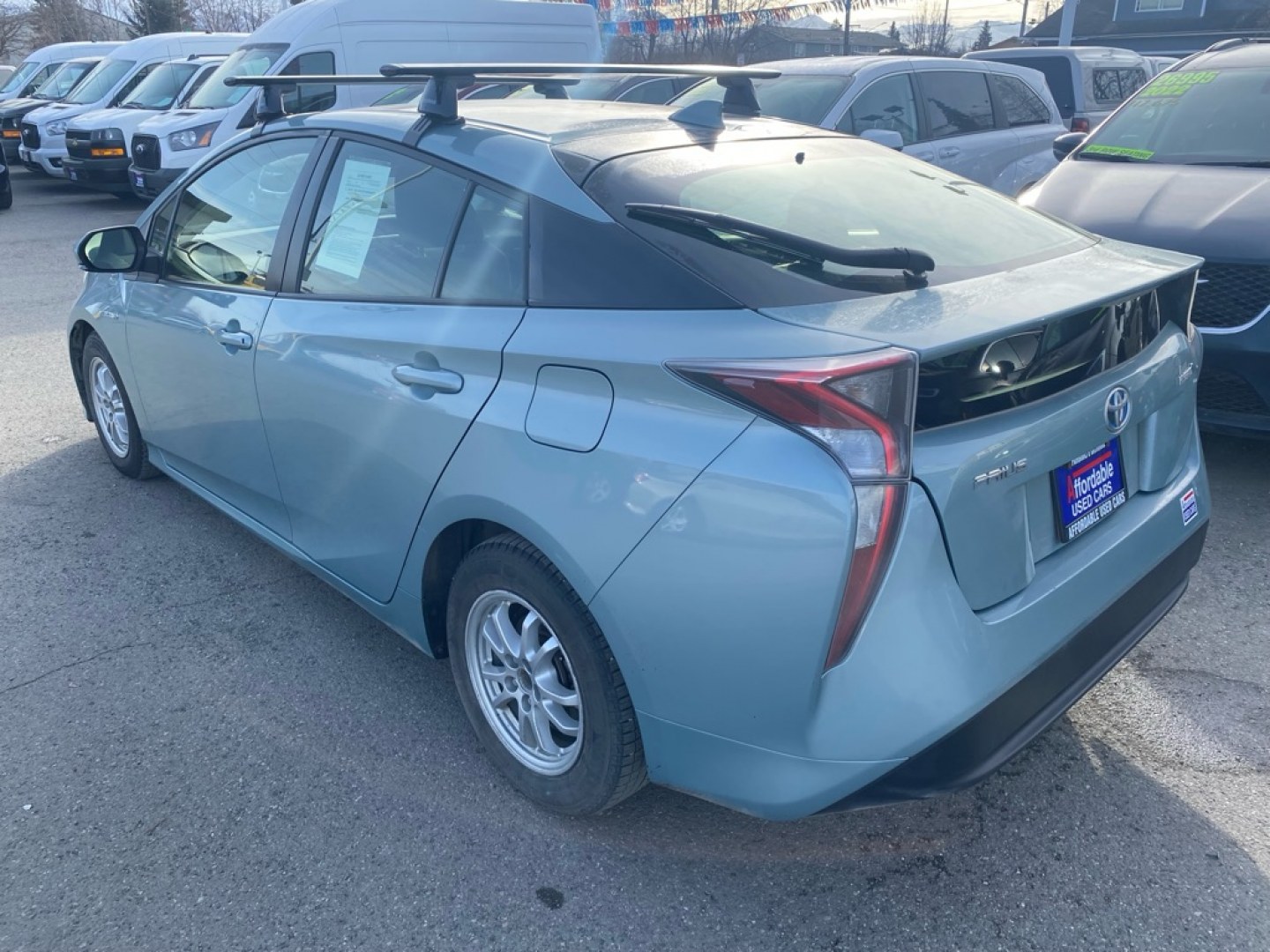 2016 BLUE TOYOTA PRIUS II (JTDKBRFU2G3) with an 1.8L engine, Continuously Variable transmission, located at 929 East 8th Ave, Anchorage, AK, 99501, (907) 274-2277, 61.214783, -149.866074- Photo#2