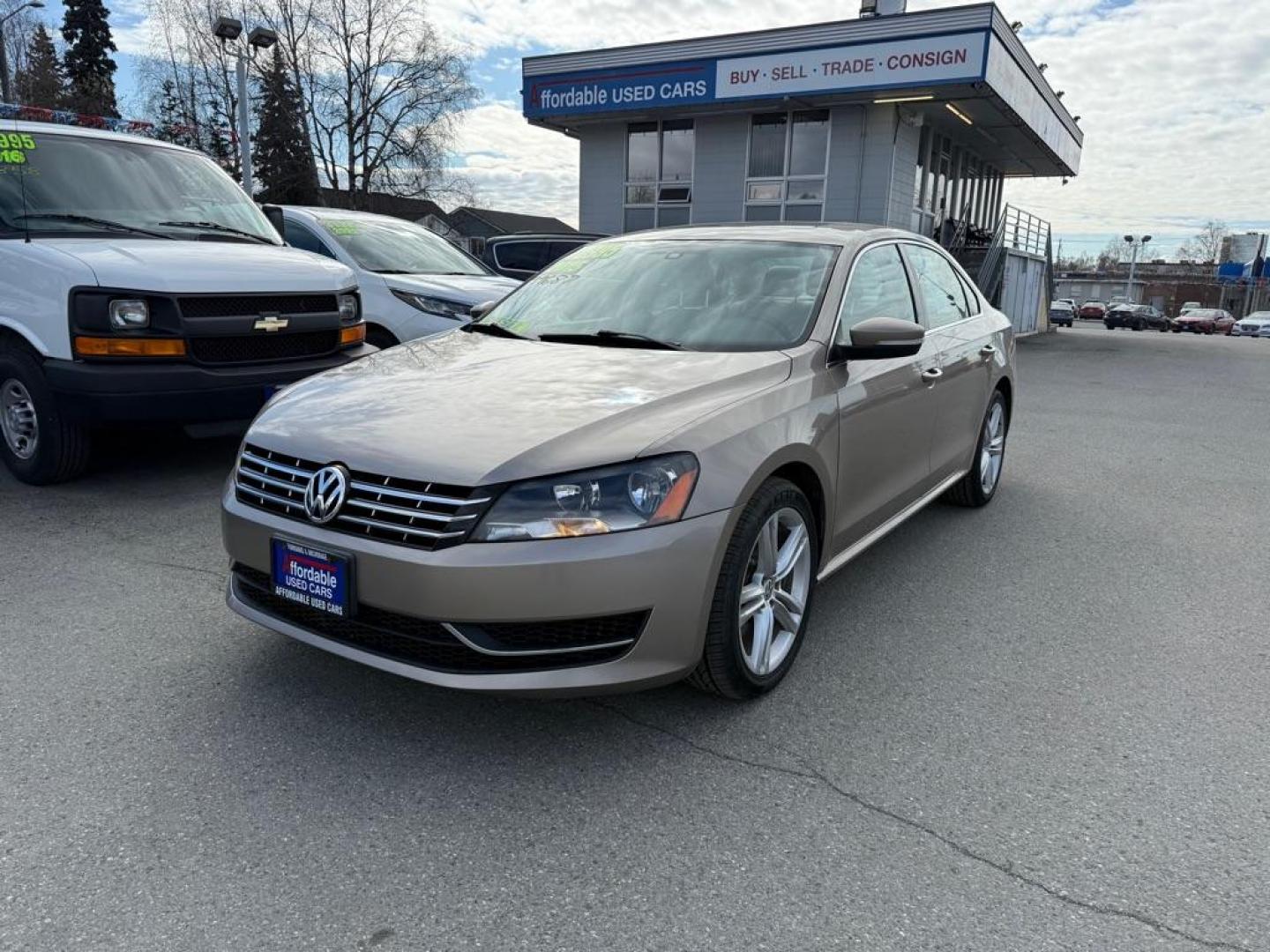 2015 GOLD VOLKSWAGEN PASSAT SE (1VWBV7A30FC) with an 2L engine, 6-Speed Manual transmission, located at 929 East 8th Ave, Anchorage, AK, 99501, (907) 274-2277, 61.214783, -149.866074 - Photo#0