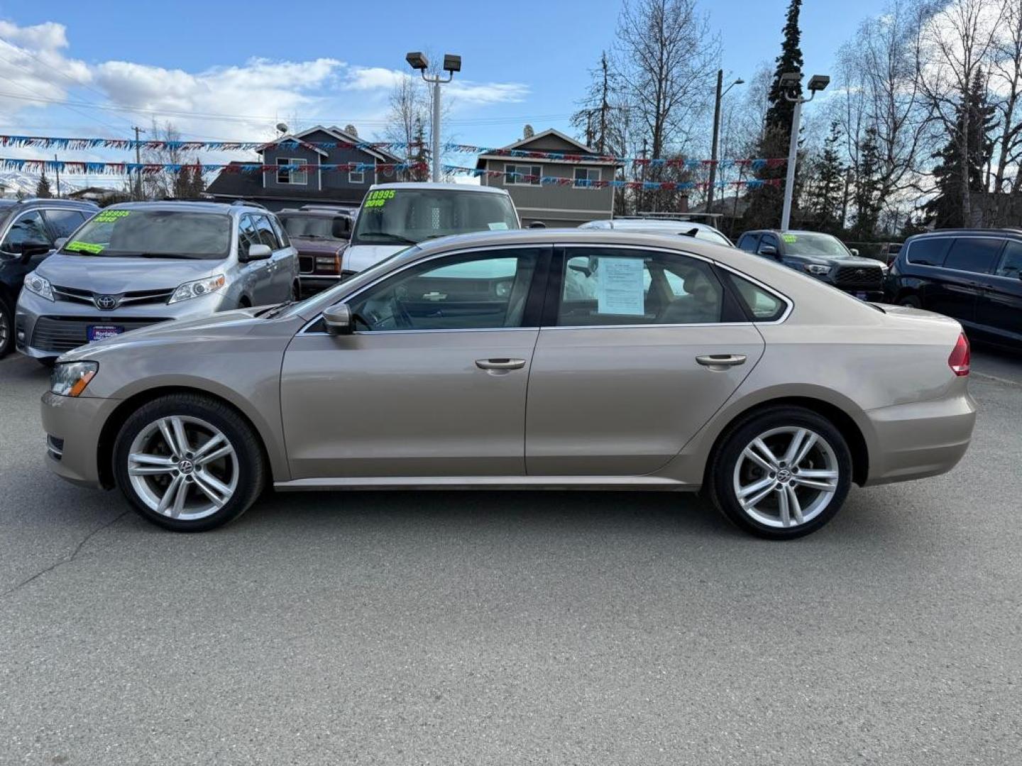 2015 GOLD VOLKSWAGEN PASSAT SE (1VWBV7A30FC) with an 2L engine, 6-Speed Manual transmission, located at 929 East 8th Ave, Anchorage, AK, 99501, (907) 274-2277, 61.214783, -149.866074 - Photo#1
