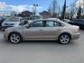 2015 GOLD VOLKSWAGEN PASSAT SE (1VWBV7A30FC) with an 2L engine, 6-Speed Manual transmission, located at 929 East 8th Ave, Anchorage, AK, 99501, (907) 274-2277, 61.214783, -149.866074 - Photo#1