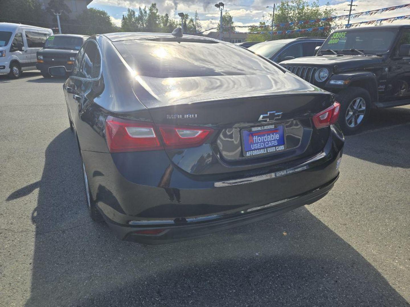 2017 BLACK CHEVROLET MALIBU LS (1G1ZB5ST8HF) with an 1.5L engine, Automatic transmission, located at 929 East 8th Ave, Anchorage, AK, 99501, (907) 274-2277, 61.214783, -149.866074 - Photo#2
