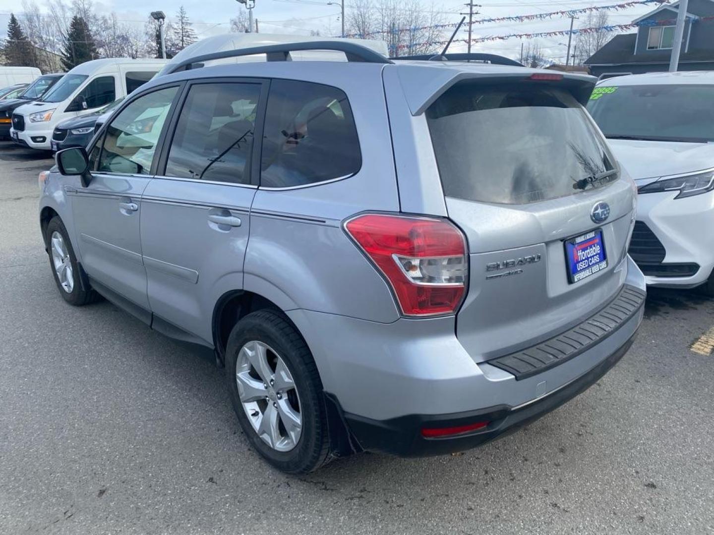 2015 SILVER SUBARU FORESTER 2.5I LIMITED (JF2SJAHC7FH) with an 2.5L engine, Continuously Variable transmission, located at 929 East 8th Ave, Anchorage, AK, 99501, (907) 274-2277, 61.214783, -149.866074 - Photo#2