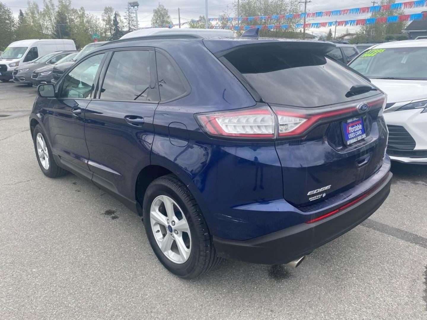 2016 BLUE FORD EDGE SE (2FMPK4G93GB) with an 2.0L engine, Automatic transmission, located at 929 East 8th Ave, Anchorage, AK, 99501, (907) 274-2277, 61.214783, -149.866074 - Photo#2