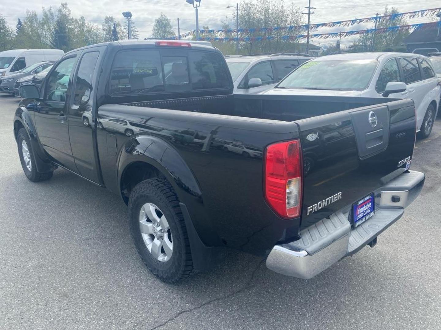 2010 BLACK NISSAN FRONTIER KING CAB SE (1N6AD0CW5AC) with an 4.0L engine, Automatic transmission, located at 929 East 8th Ave, Anchorage, AK, 99501, (907) 274-2277, 61.214783, -149.866074 - Photo#2
