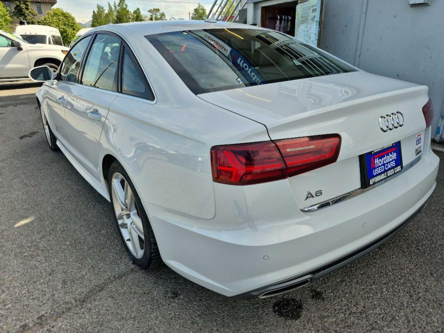 2016 WHITE AUDI A6 PREMIUM PLUS (WAUGFAFC4GN) with an 2.0L engine, Automatic transmission, located at 929 East 8th Ave, Anchorage, AK, 99501, (907) 274-2277, 61.214783, -149.866074 - Photo#2