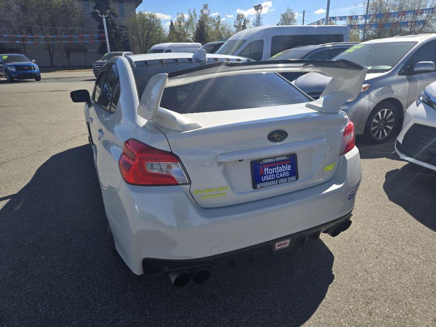 2021 WHITE SUBARU WRX STI (JF1VA2E66M9) with an 2.5L engine, 6-Speed Manual transmission, located at 929 East 8th Ave, Anchorage, AK, 99501, (907) 274-2277, 61.214783, -149.866074 - Photo#2