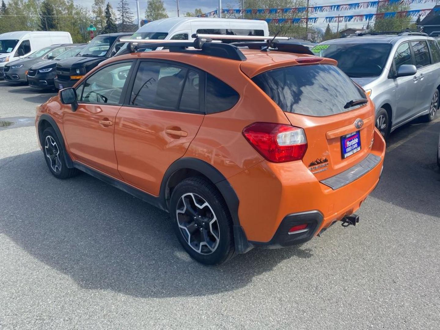 2014 ORANGE SUBARU XV CROSSTREK 2.0 PREMIUM (JF2GPACC7EH) with an 2.0L engine, Continuously Variable transmission, located at 929 East 8th Ave, Anchorage, AK, 99501, (907) 274-2277, 61.214783, -149.866074 - Photo#2
