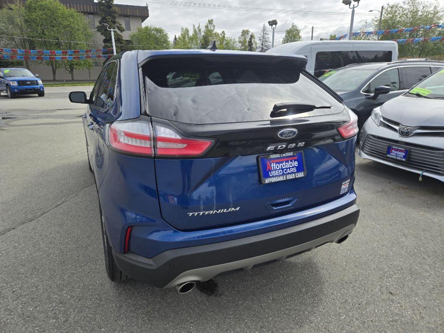 2023 BLUE FORD EDGE TITANIUM TITANIUM (2FMPK4K94PB) with an 2.0L engine, Automatic transmission, located at 929 East 8th Ave, Anchorage, AK, 99501, (907) 274-2277, 61.214783, -149.866074 - Photo#2