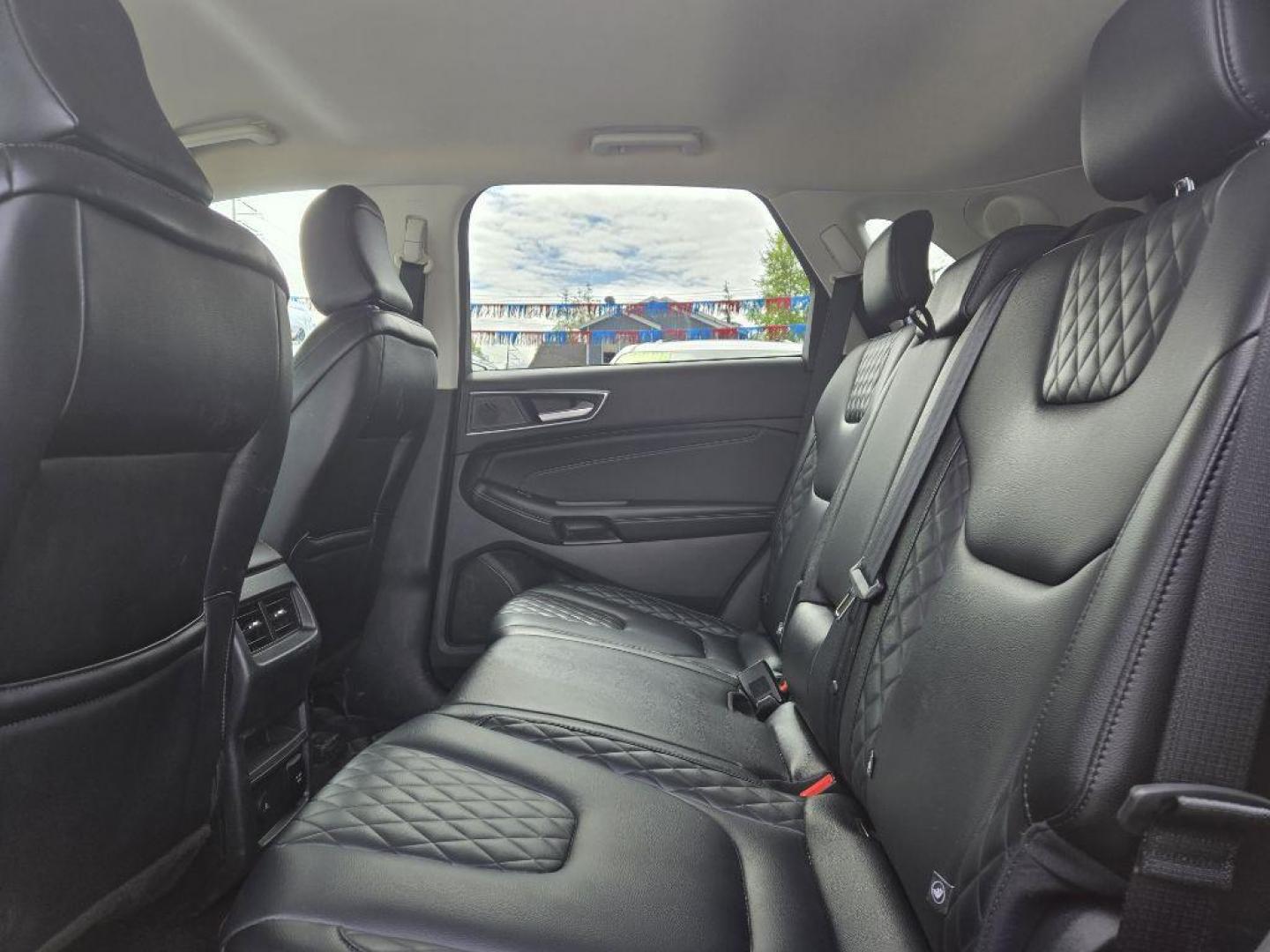 2023 BLUE FORD EDGE TITANIUM TITANIUM (2FMPK4K94PB) with an 2.0L engine, Automatic transmission, located at 929 East 8th Ave, Anchorage, AK, 99501, (907) 274-2277, 61.214783, -149.866074 - Photo#3