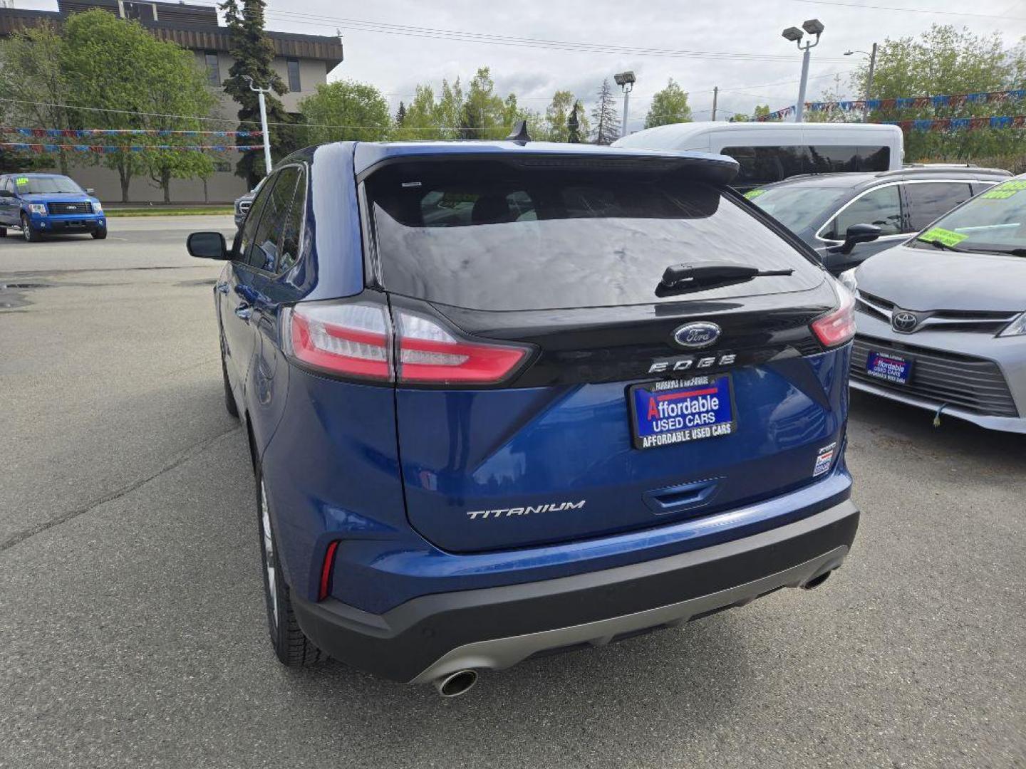 2023 BLUE FORD EDGE TITANIUM TITANIUM (2FMPK4K98PB) with an 2.0L engine, Automatic transmission, located at 929 East 8th Ave, Anchorage, AK, 99501, (907) 274-2277, 61.214783, -149.866074 - Photo#2