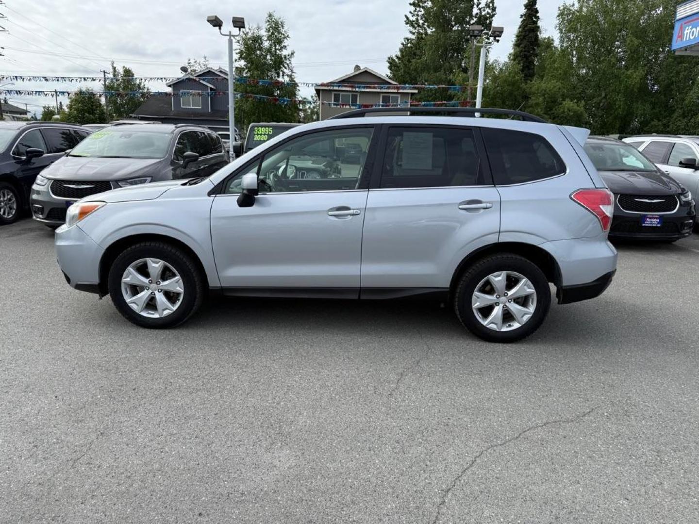 2015 SILVER SUBARU FORESTER 2.5I LIMITED (JF2SJAHC4FH) with an 2.5L engine, Continuously Variable transmission, located at 929 East 8th Ave, Anchorage, AK, 99501, (907) 274-2277, 61.214783, -149.866074 - Photo#1