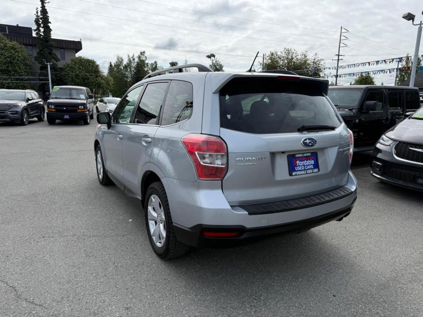2015 SILVER SUBARU FORESTER 2.5I LIMITED (JF2SJAHC4FH) with an 2.5L engine, Continuously Variable transmission, located at 929 East 8th Ave, Anchorage, AK, 99501, (907) 274-2277, 61.214783, -149.866074 - Photo#2