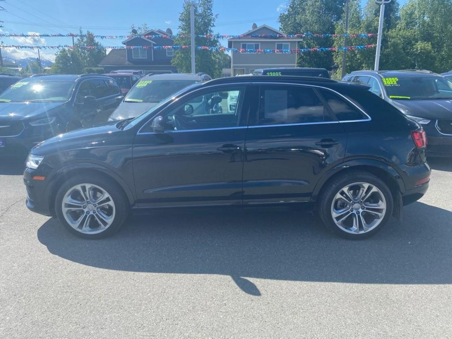 2016 BLACK AUDI Q3 PREMIUM PLUS (WA1EFCFS3GR) with an 2.0L engine, Automatic transmission, located at 929 East 8th Ave, Anchorage, AK, 99501, (907) 274-2277, 61.214783, -149.866074 - Photo#1