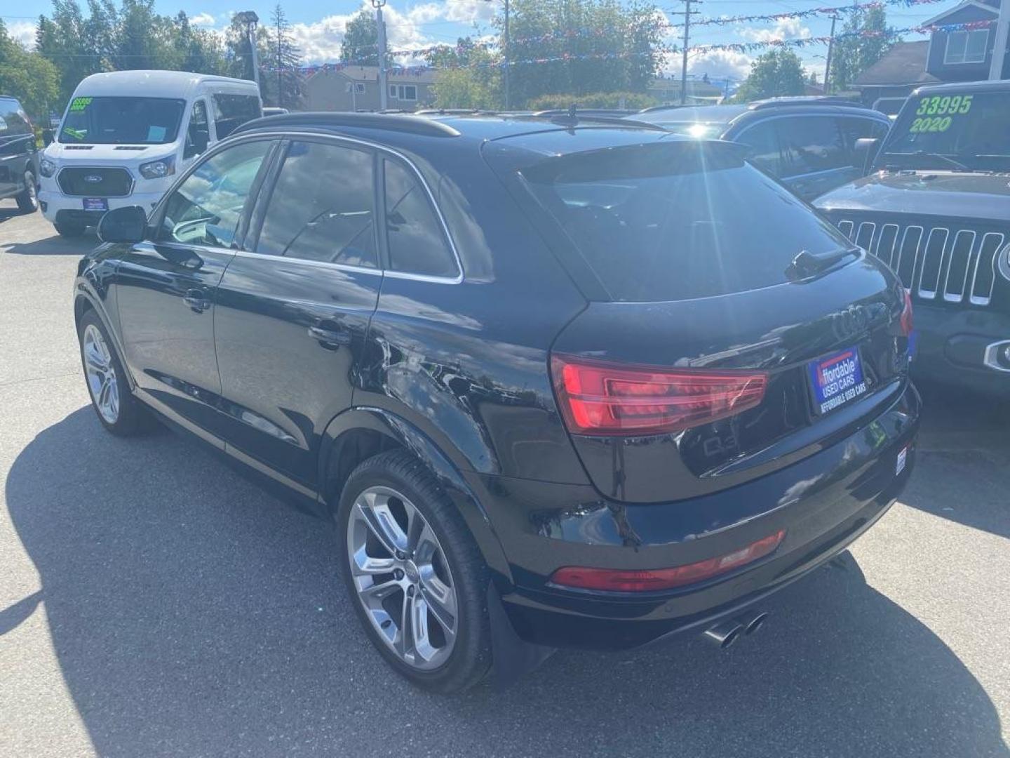 2016 BLACK AUDI Q3 PREMIUM PLUS (WA1EFCFS3GR) with an 2.0L engine, Automatic transmission, located at 929 East 8th Ave, Anchorage, AK, 99501, (907) 274-2277, 61.214783, -149.866074 - Photo#2