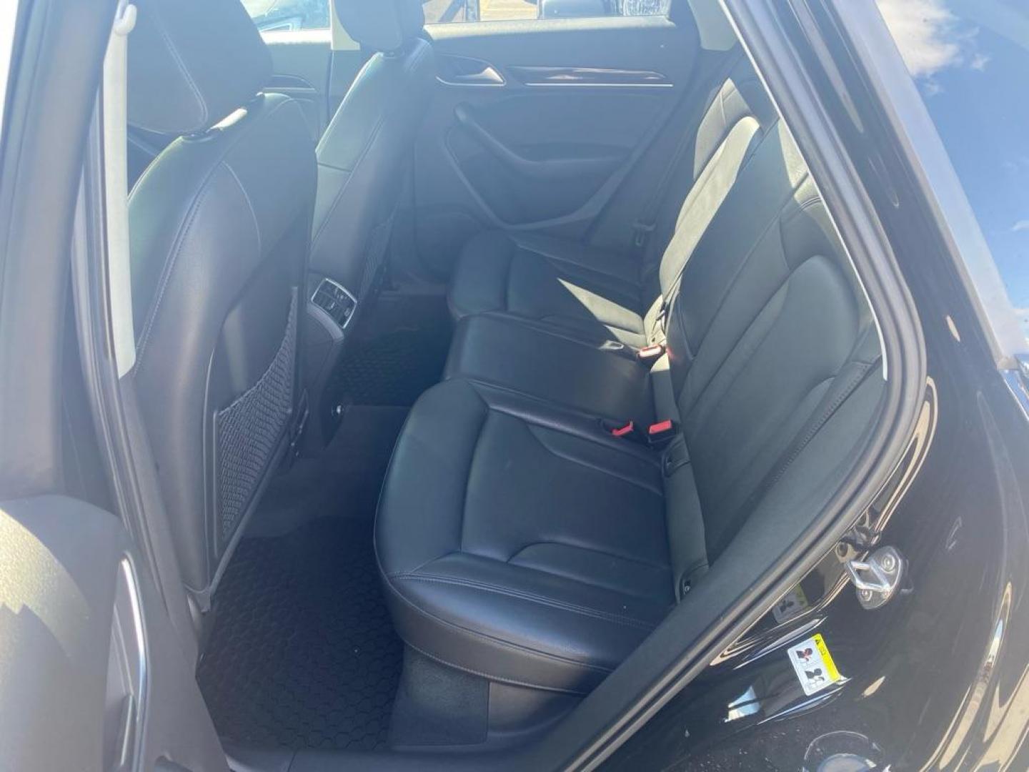 2016 BLACK AUDI Q3 PREMIUM PLUS (WA1EFCFS3GR) with an 2.0L engine, Automatic transmission, located at 929 East 8th Ave, Anchorage, AK, 99501, (907) 274-2277, 61.214783, -149.866074 - Photo#3