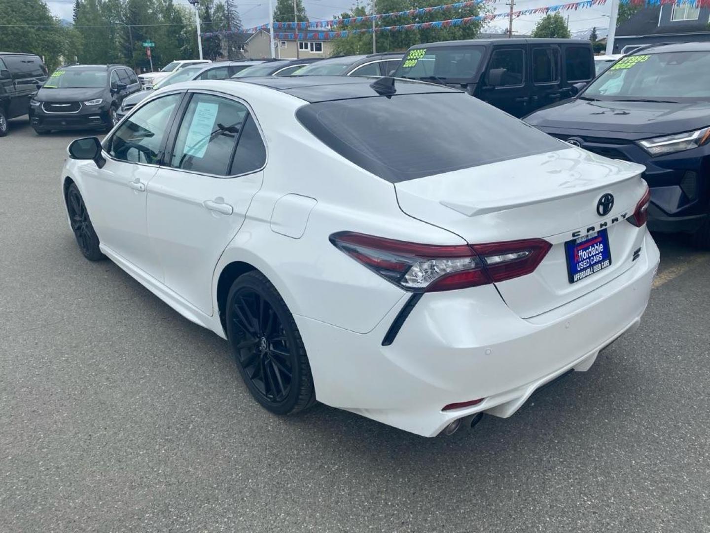 2022 WHITE TOYOTA CAMRY XSE (4T1K61BK2NU) with an 2.5L engine, Automatic transmission, located at 929 East 8th Ave, Anchorage, AK, 99501, (907) 274-2277, 61.214783, -149.866074 - Photo#2