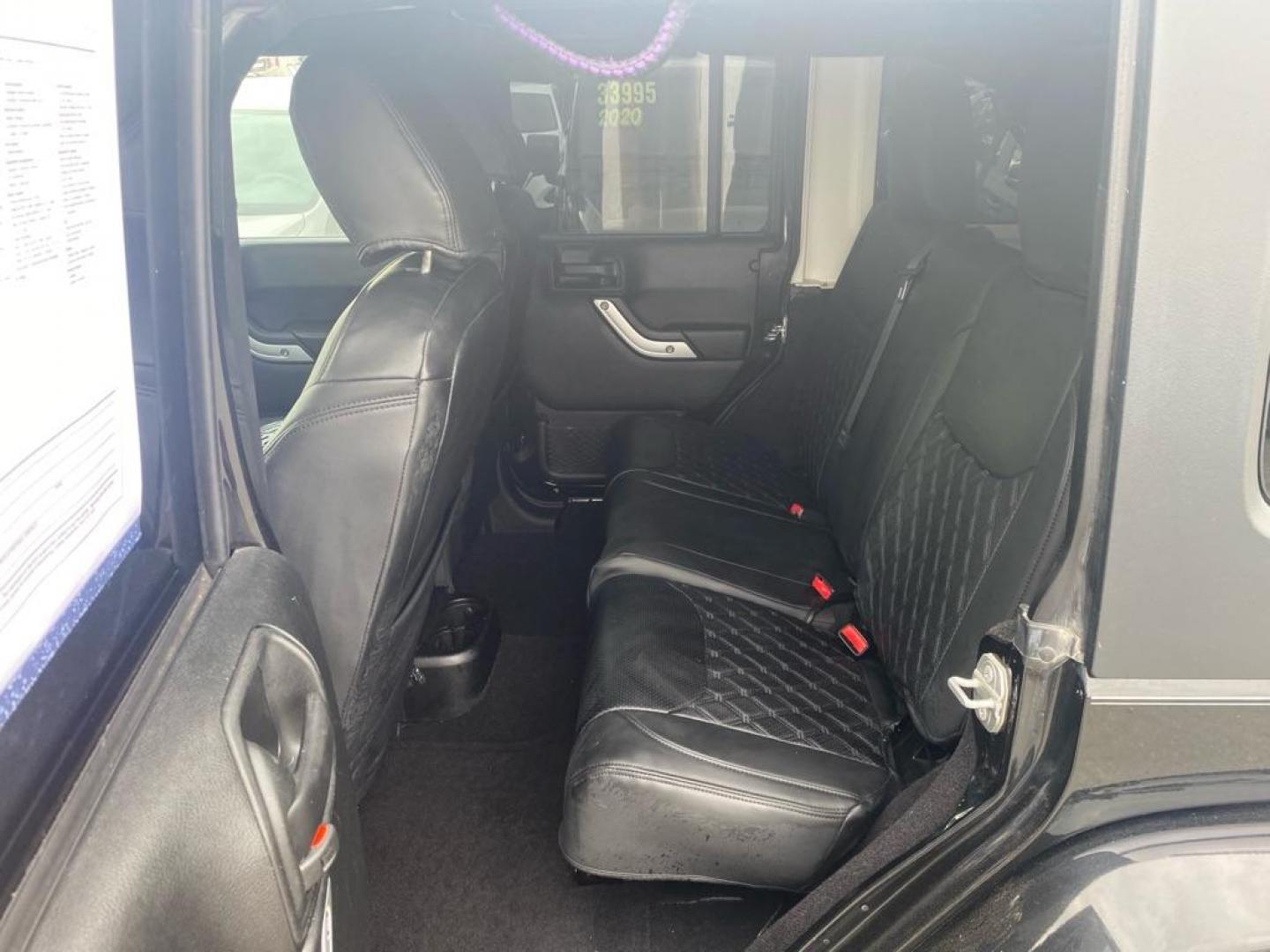 2017 BLACK JEEP WRANGLER UNLIMI SAHARA (1C4HJWEG4HL) with an 3.6L engine, Automatic transmission, located at 929 East 8th Ave, Anchorage, AK, 99501, (907) 274-2277, 61.214783, -149.866074 - Photo#3