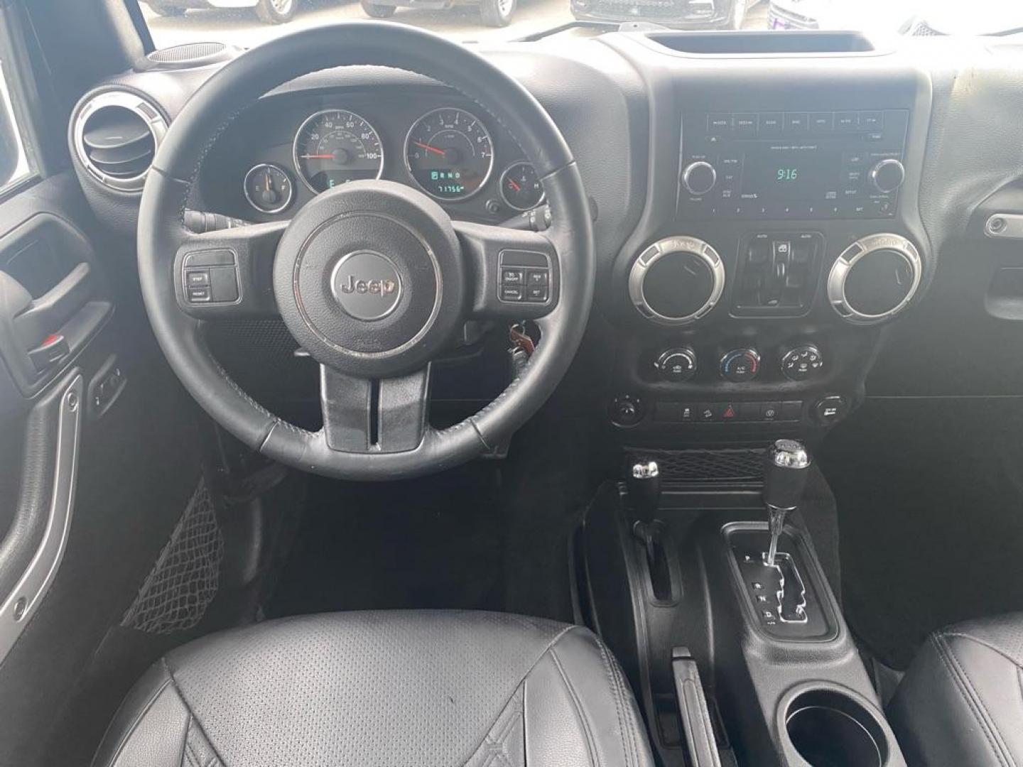 2017 BLACK JEEP WRANGLER UNLIMI SAHARA (1C4HJWEG4HL) with an 3.6L engine, Automatic transmission, located at 929 East 8th Ave, Anchorage, AK, 99501, (907) 274-2277, 61.214783, -149.866074 - Photo#4