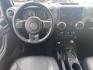2017 BLACK JEEP WRANGLER UNLIMI SAHARA (1C4HJWEG4HL) with an 3.6L engine, Automatic transmission, located at 929 East 8th Ave, Anchorage, AK, 99501, (907) 274-2277, 61.214783, -149.866074 - Photo#4
