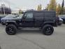 2017 BLACK JEEP WRANGLER UNLIMI SAHARA (1C4HJWEG4HL) with an 3.6L engine, Automatic transmission, located at 929 East 8th Ave, Anchorage, AK, 99501, (907) 274-2277, 61.214783, -149.866074 - Photo#1
