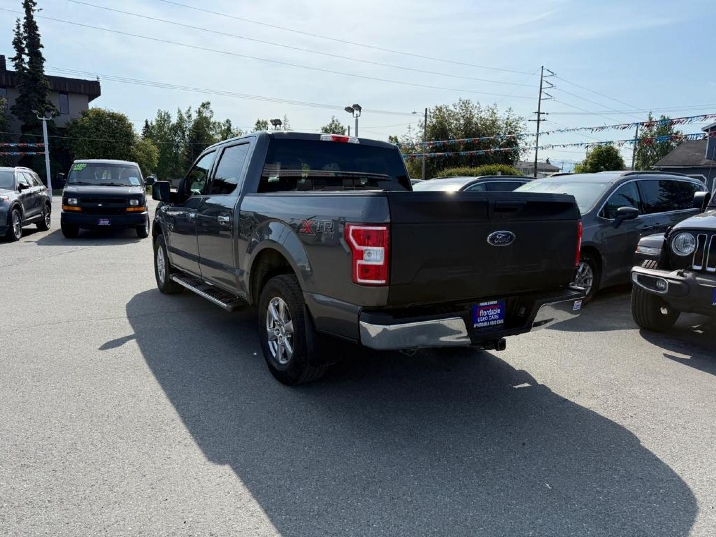 2019 GRAY FORD F150 SUPERCREW (1FTEW1EP3KF) with an 2.7L engine, Automatic transmission, located at 929 East 8th Ave, Anchorage, AK, 99501, (907) 274-2277, 61.214783, -149.866074 - Photo#2