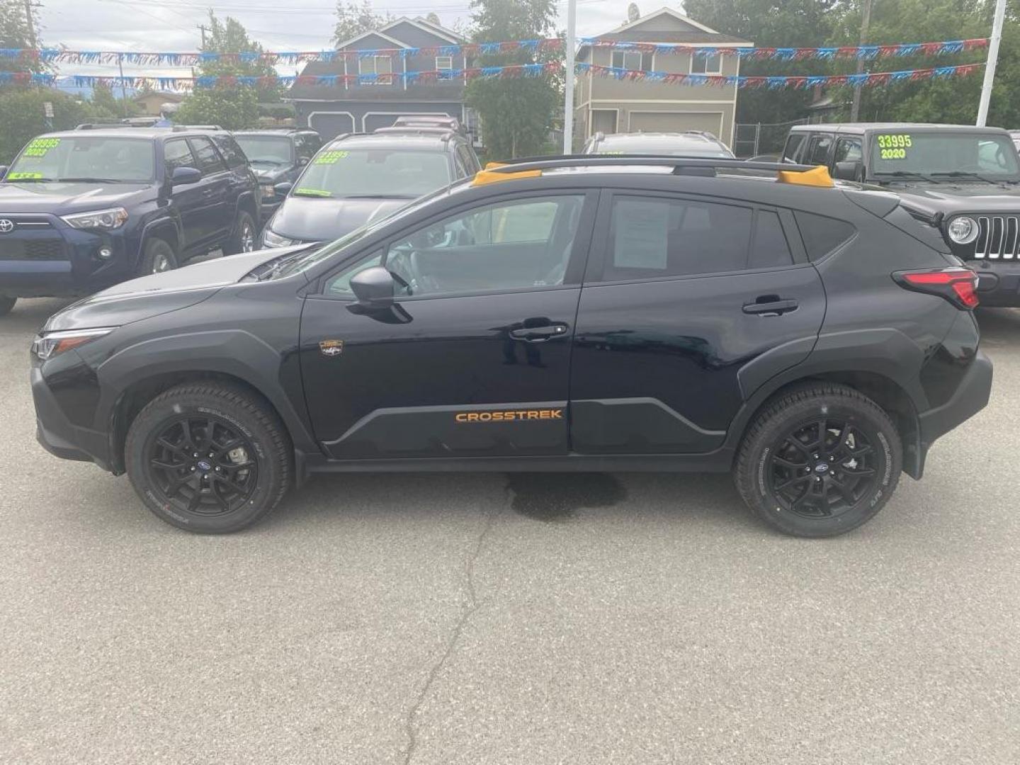 2024 BLACK SUBARU CROSSTREK WILDERNESS (4S4GUHU68R3) with an 2.5L engine, Continuously Variable transmission, located at 929 East 8th Ave, Anchorage, AK, 99501, (907) 274-2277, 61.214783, -149.866074 - Photo#1