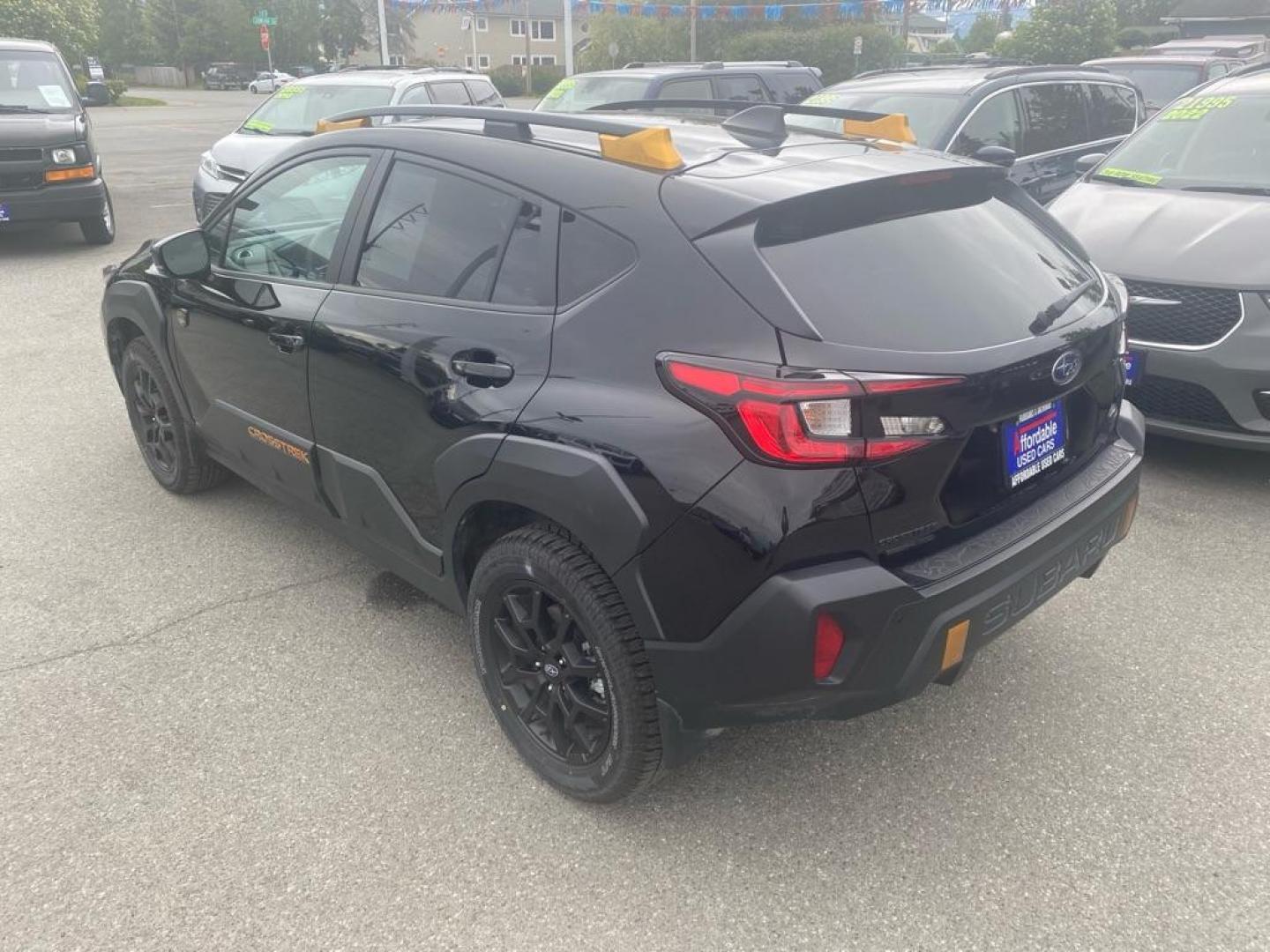 2024 BLACK SUBARU CROSSTREK WILDERNESS (4S4GUHU68R3) with an 2.5L engine, Continuously Variable transmission, located at 929 East 8th Ave, Anchorage, AK, 99501, (907) 274-2277, 61.214783, -149.866074 - Photo#2