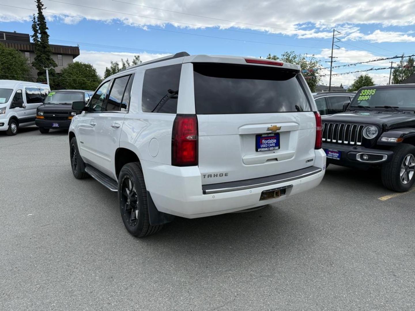 2017 WHITE CHEVROLET TAHOE 1500 PREMIER (1GNSKCKC4HR) with an 5.3L engine, Automatic transmission, located at 929 East 8th Ave, Anchorage, AK, 99501, (907) 274-2277, 61.214783, -149.866074 - Photo#2