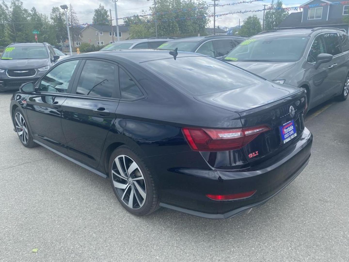 2021 BLACK VOLKSWAGEN JETTA GLI (3VW6T7BU6MM) with an 2.0L engine, Automatic transmission, located at 929 East 8th Ave, Anchorage, AK, 99501, (907) 274-2277, 61.214783, -149.866074 - Photo#2
