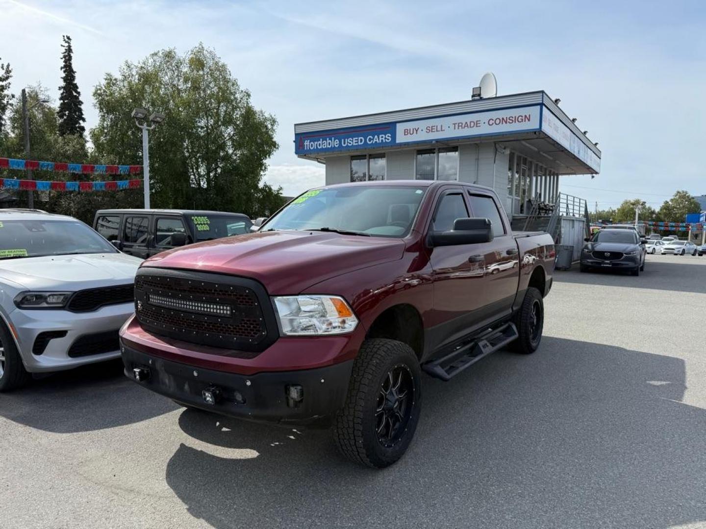 2016 MAROON RAM 1500 SLT (1C6RR7LG5GS) with an 3.6L engine, Automatic transmission, located at 929 East 8th Ave, Anchorage, AK, 99501, (907) 274-2277, 61.214783, -149.866074 - Photo#0