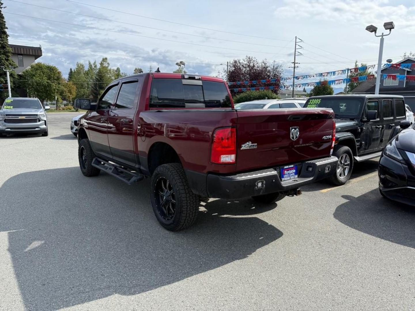 2016 MAROON RAM 1500 SLT (1C6RR7LG5GS) with an 3.6L engine, Automatic transmission, located at 929 East 8th Ave, Anchorage, AK, 99501, (907) 274-2277, 61.214783, -149.866074 - Photo#2