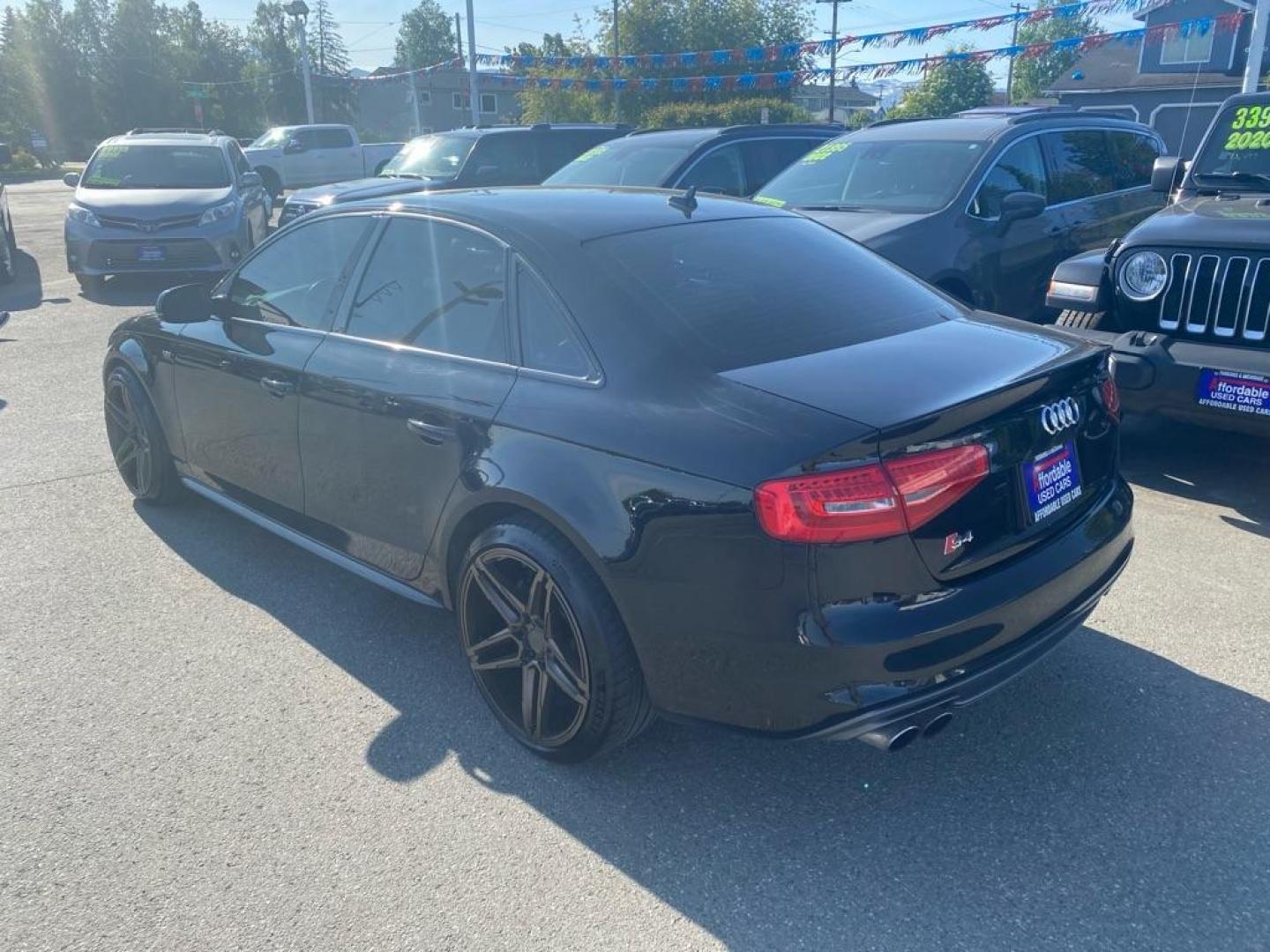 2016 BLACK AUDI S4 PREMIUM PLUS (WAUBGAFLXGA) with an 3.0L engine, Automatic transmission, located at 929 East 8th Ave, Anchorage, AK, 99501, (907) 274-2277, 61.214783, -149.866074 - Photo#2