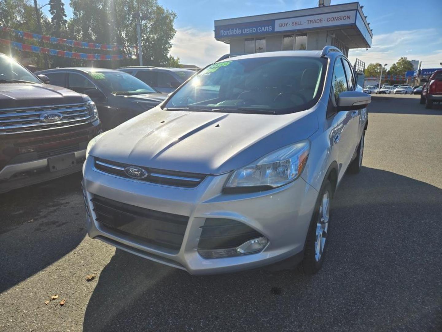 2014 SILVER FORD ESCAPE TITANIUM (1FMCU9JX6EU) with an 1.6L engine, Automatic transmission, located at 929 East 8th Ave, Anchorage, AK, 99501, (907) 274-2277, 61.214783, -149.866074 - Photo#0