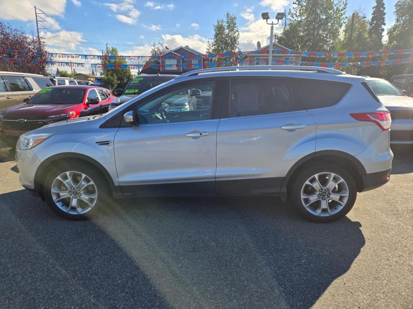 2014 SILVER FORD ESCAPE TITANIUM (1FMCU9JX6EU) with an 1.6L engine, Automatic transmission, located at 929 East 8th Ave, Anchorage, AK, 99501, (907) 274-2277, 61.214783, -149.866074 - Photo#1