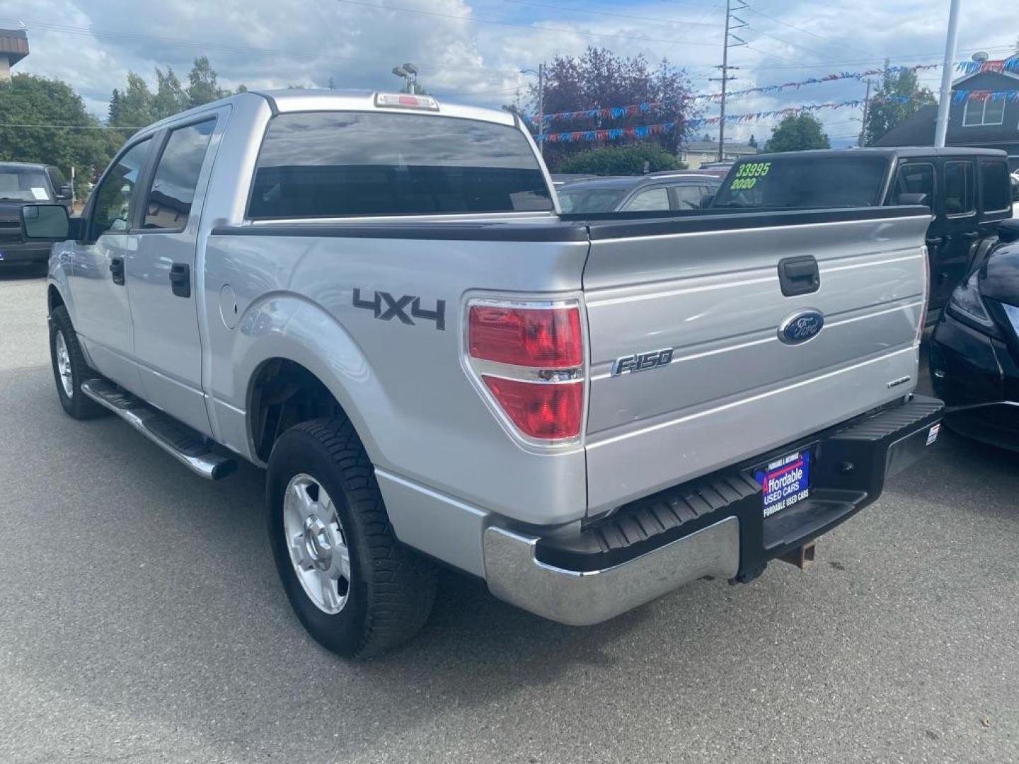 2013 SILVER FORD F150 SUPERCREW (1FTFW1EF6DF) with an 5.0L engine, Automatic transmission, located at 929 East 8th Ave, Anchorage, AK, 99501, (907) 274-2277, 61.214783, -149.866074 - Photo#2