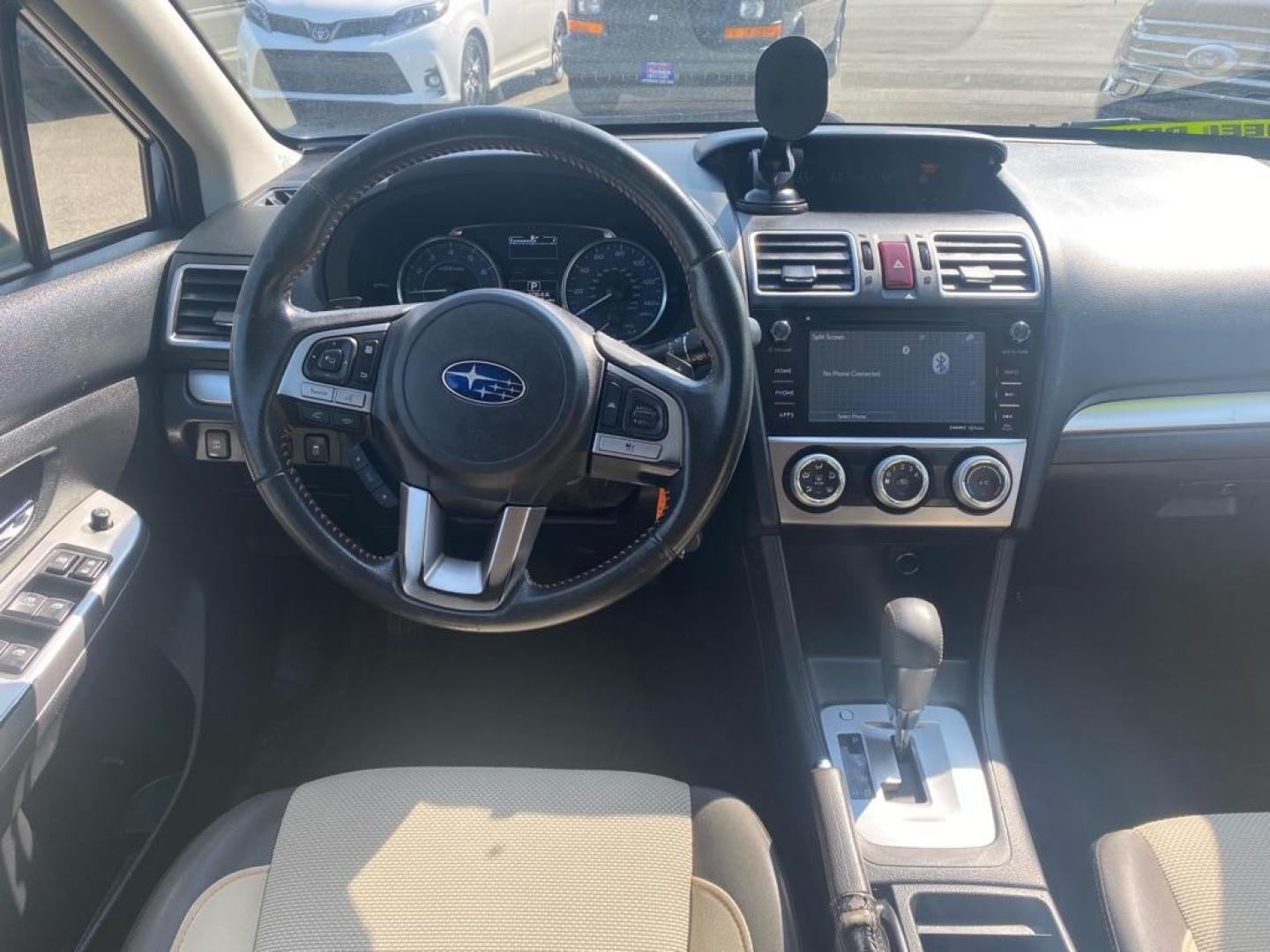 2016 BLUE SUBARU CROSSTREK PREMIUM (JF2GPADC3G8) with an 2.0L engine, 5-Speed Manual transmission, located at 929 East 8th Ave, Anchorage, AK, 99501, (907) 274-2277, 61.214783, -149.866074 - Photo#4