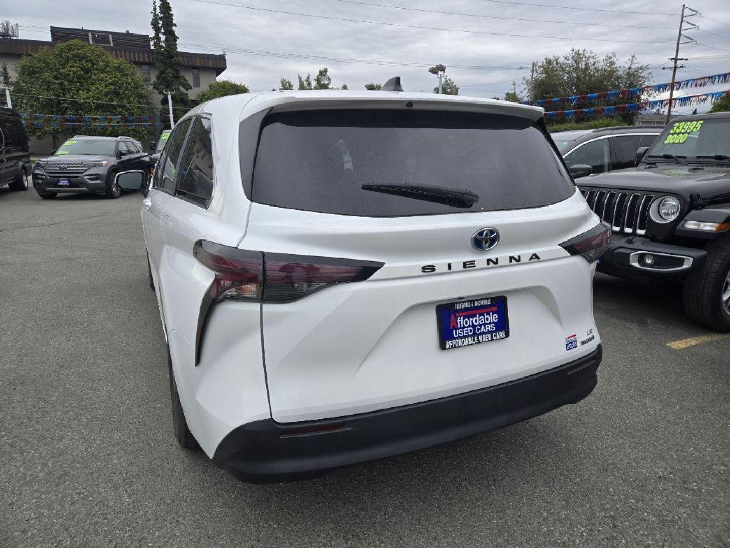 2023 WHITE TOYOTA SIENNA LE (5TDKRKEC0PS) with an 2.5L engine, Automatic transmission, located at 929 East 8th Ave, Anchorage, AK, 99501, (907) 274-2277, 61.214783, -149.866074 - Photo#2