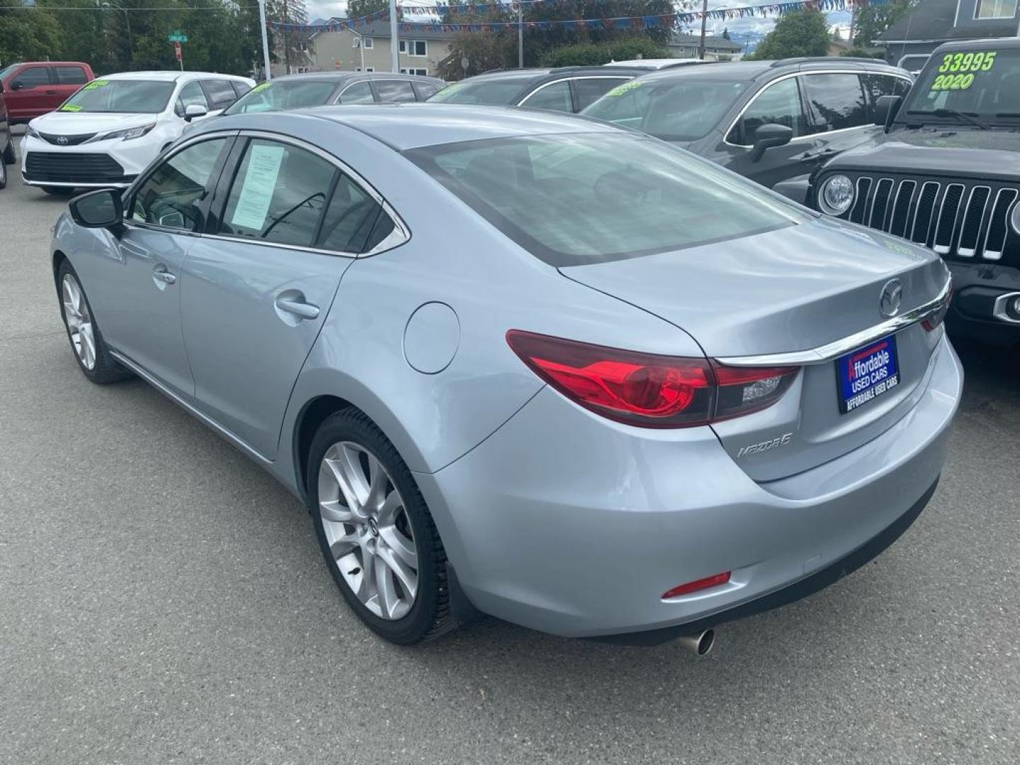 2017 SILVER MAZDA 6 TOURING (JM1GL1V51H1) with an 2.5L engine, Automatic transmission, located at 929 East 8th Ave, Anchorage, AK, 99501, (907) 274-2277, 61.214783, -149.866074 - Photo#2