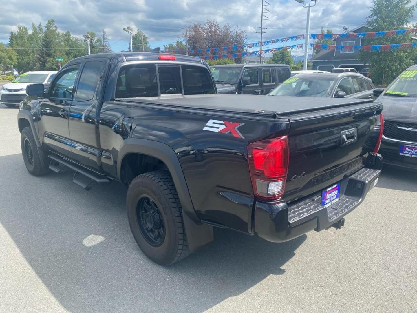 2021 BLACK TOYOTA TACOMA ACCESS CAB (3TYSZ5AN9MT) with an 3.5L engine, Automatic transmission, located at 929 East 8th Ave, Anchorage, AK, 99501, (907) 274-2277, 61.214783, -149.866074 - Photo#2