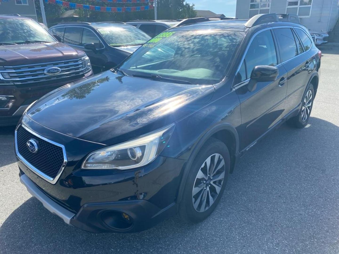 2016 BLACK SUBARU OUTBACK 2.5I LIMITED (4S4BSANC8G3) with an 2.5L engine, Continuously Variable transmission, located at 929 East 8th Ave, Anchorage, AK, 99501, (907) 274-2277, 61.214783, -149.866074 - Photo#0