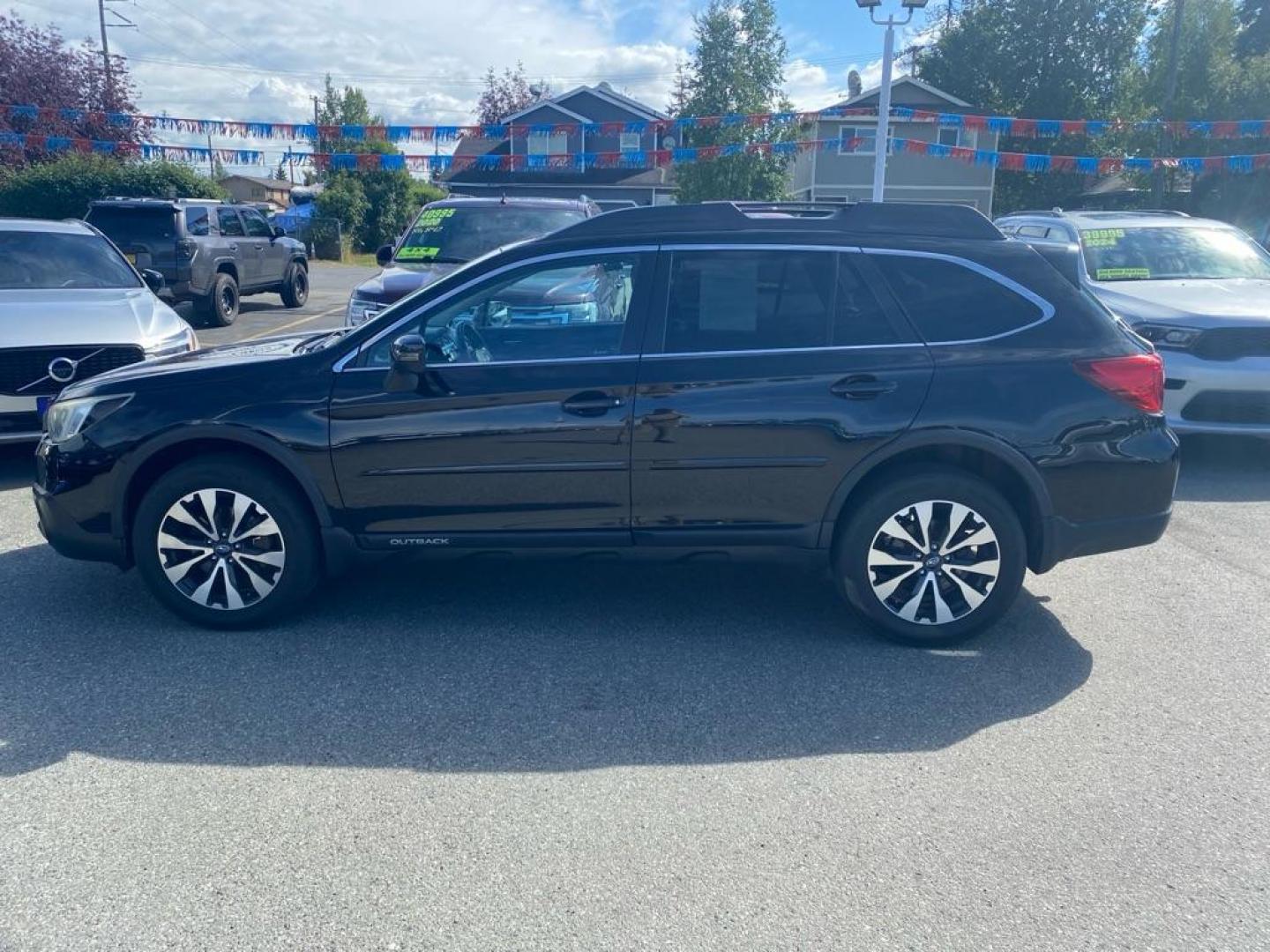 2016 BLACK SUBARU OUTBACK 2.5I LIMITED (4S4BSANC8G3) with an 2.5L engine, Continuously Variable transmission, located at 929 East 8th Ave, Anchorage, AK, 99501, (907) 274-2277, 61.214783, -149.866074 - Photo#1