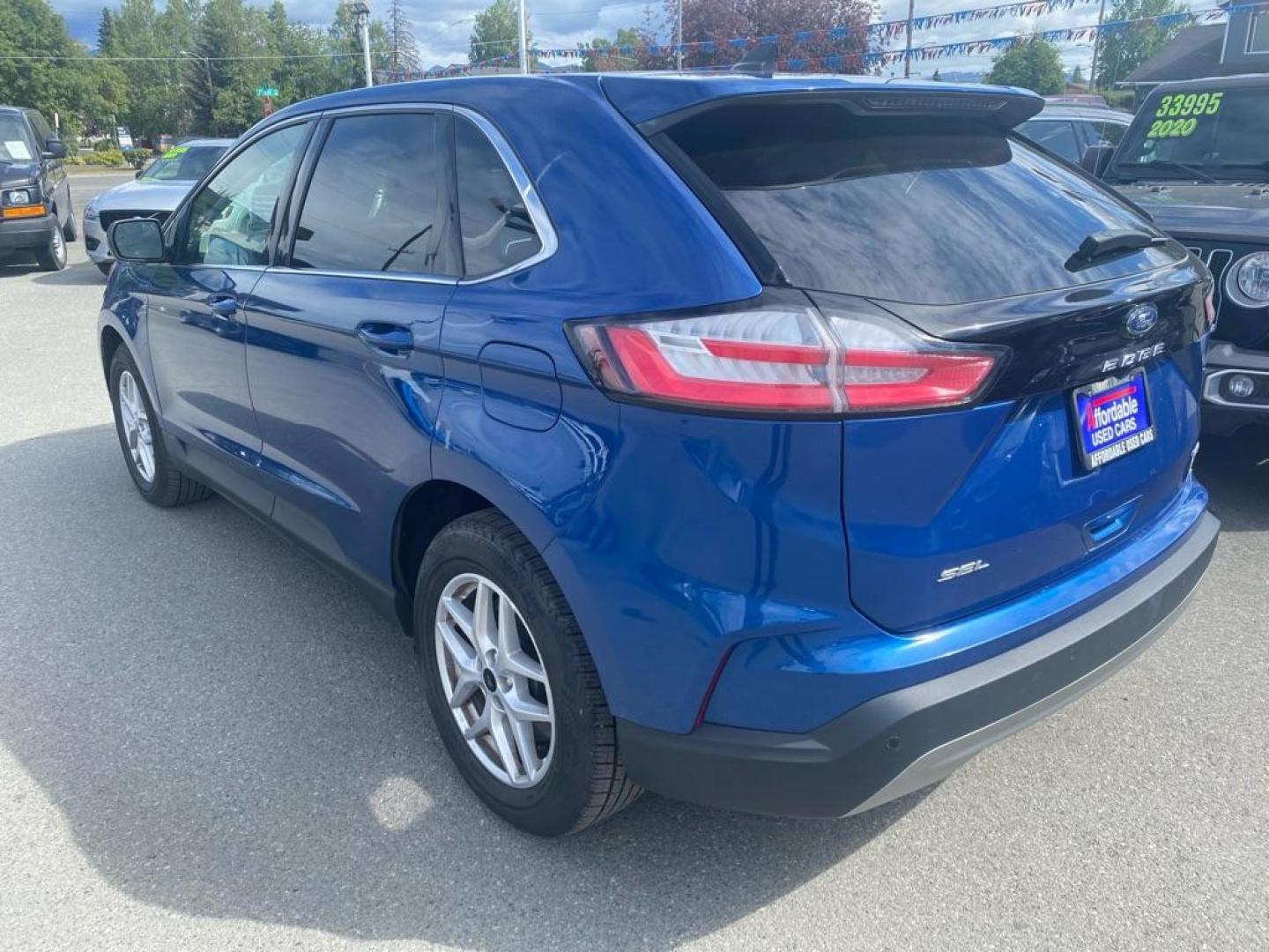 2024 BLUE FORD EDGE SEL SEL (2FMPK4J98RB) with an 2.0L engine, Automatic transmission, located at 929 East 8th Ave, Anchorage, AK, 99501, (907) 274-2277, 61.214783, -149.866074 - Photo#2