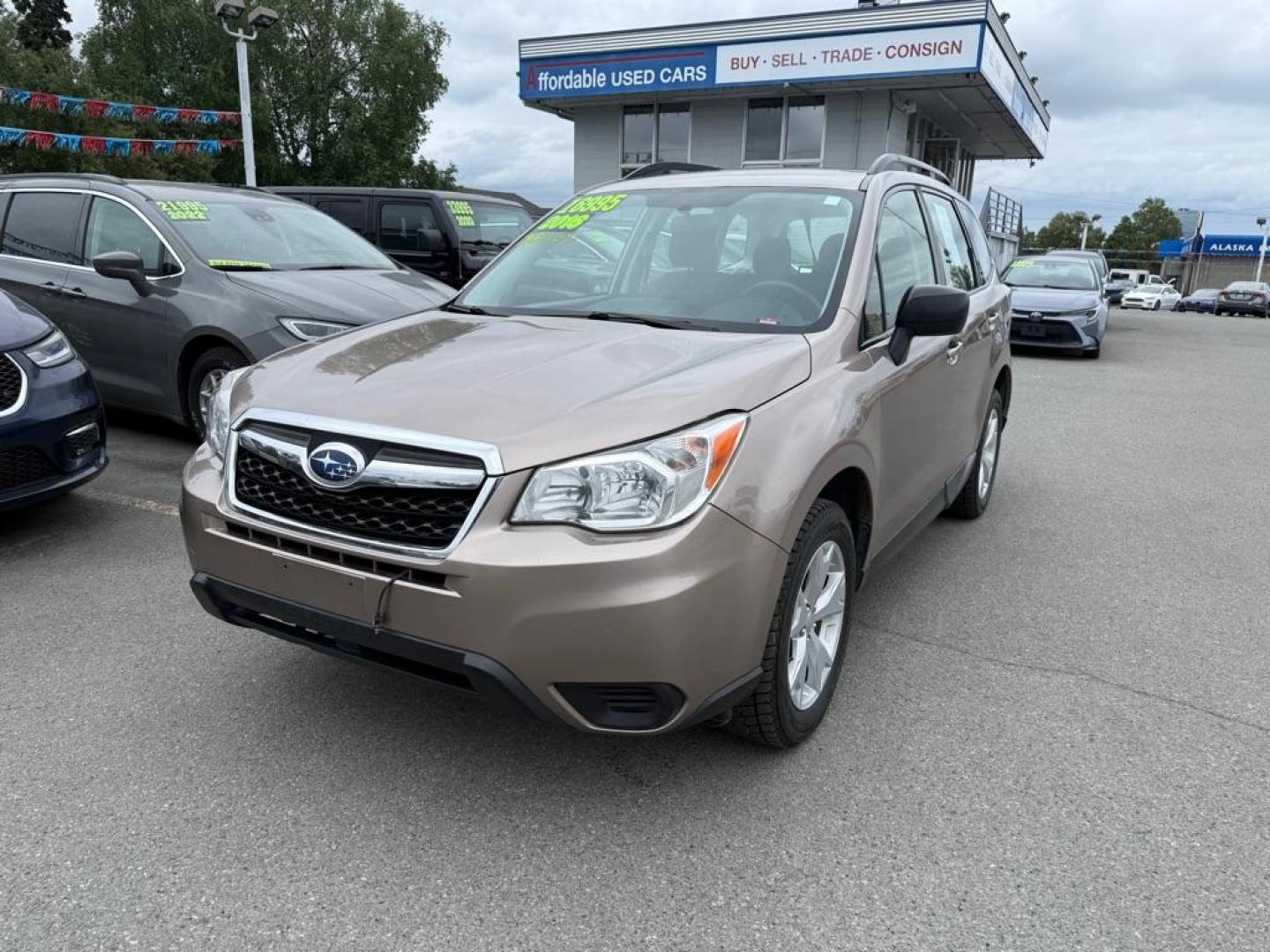 2016 BRONZE SUBARU FORESTER 2.5I (JF2SJABC2GH) with an 2.5L engine, 6-Speed Manual transmission, located at 929 East 8th Ave, Anchorage, AK, 99501, (907) 274-2277, 61.214783, -149.866074 - Photo#0