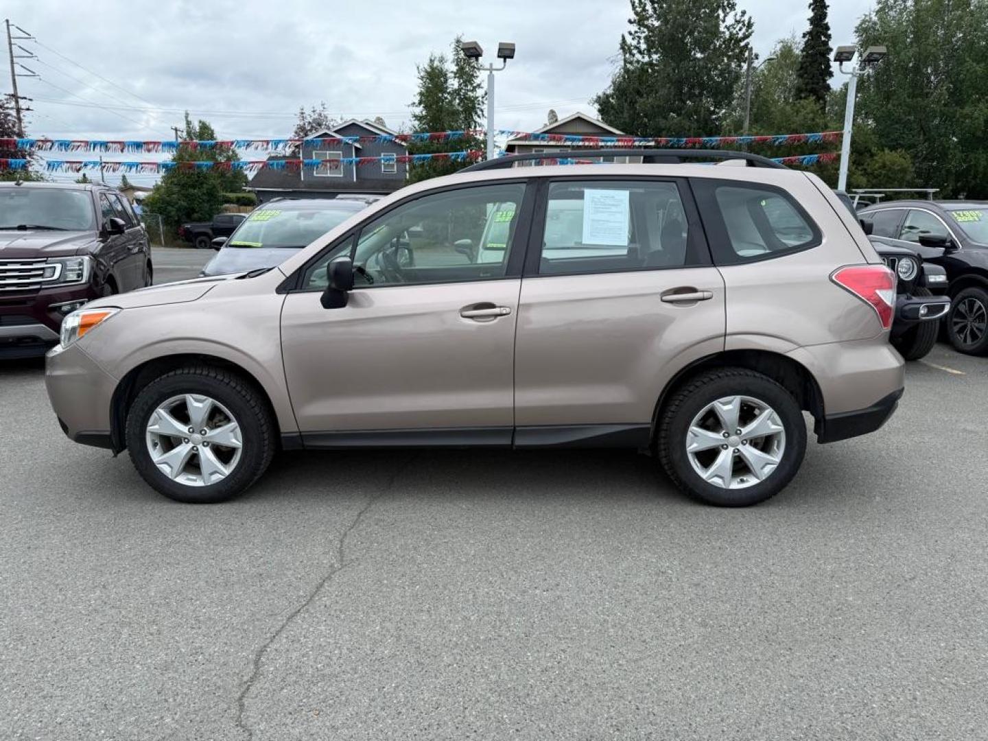 2016 BRONZE SUBARU FORESTER 2.5I (JF2SJABC2GH) with an 2.5L engine, 6-Speed Manual transmission, located at 929 East 8th Ave, Anchorage, AK, 99501, (907) 274-2277, 61.214783, -149.866074 - Photo#1