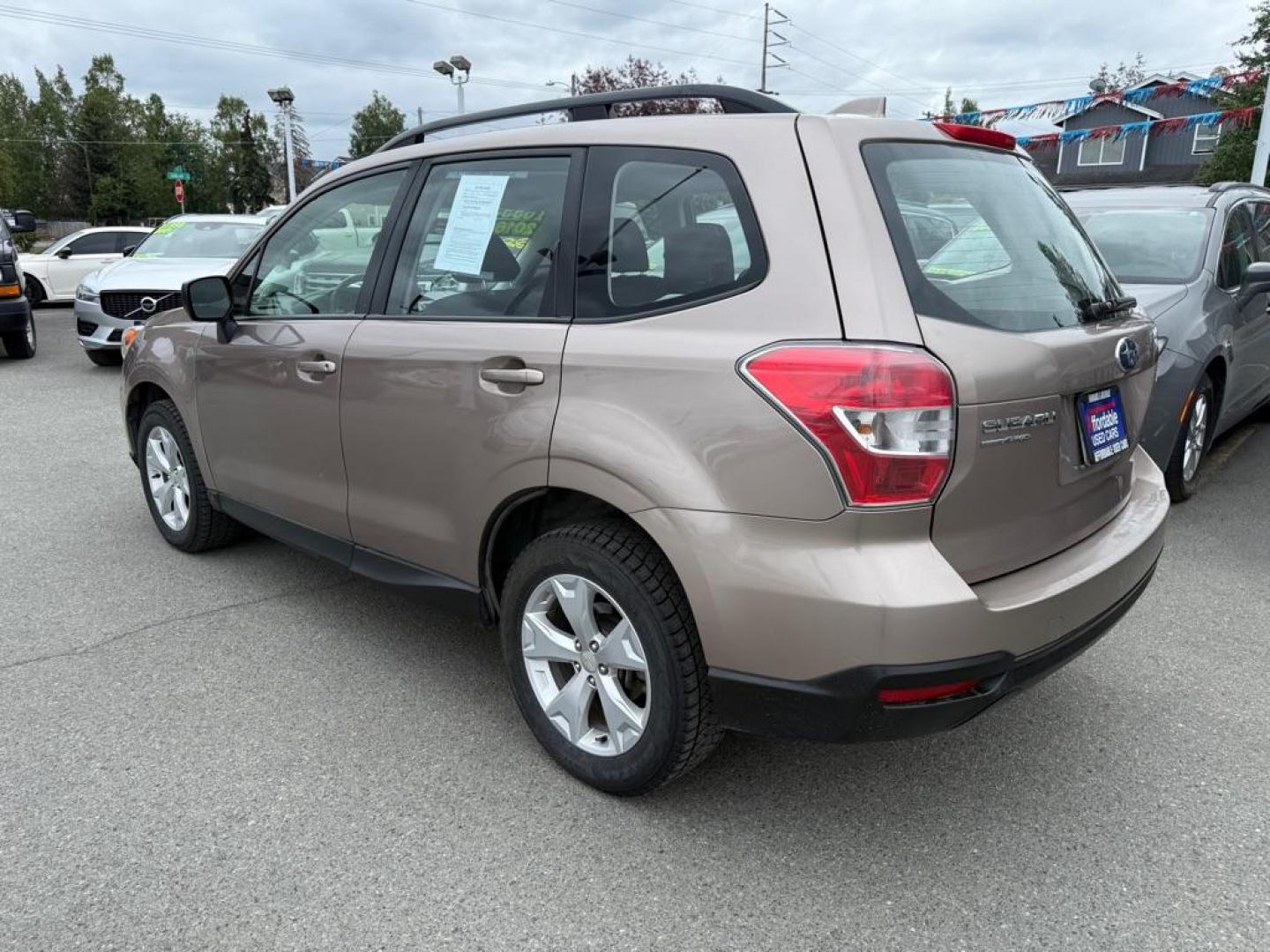 2016 BRONZE SUBARU FORESTER 2.5I (JF2SJABC2GH) with an 2.5L engine, 6-Speed Manual transmission, located at 929 East 8th Ave, Anchorage, AK, 99501, (907) 274-2277, 61.214783, -149.866074 - Photo#2