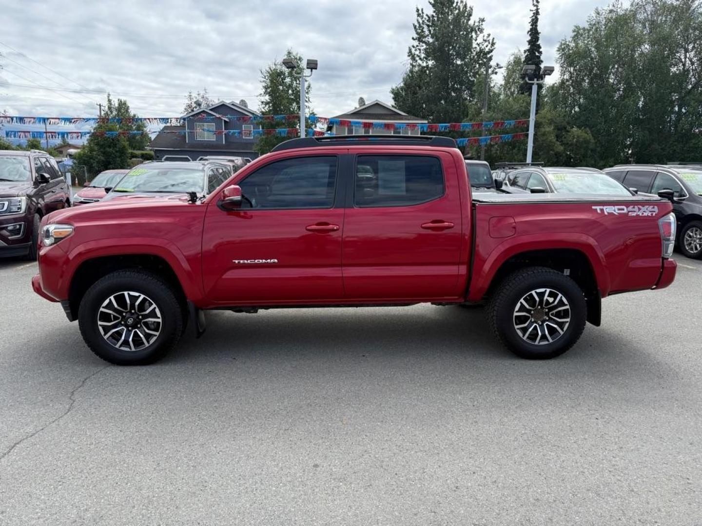 2021 RED TOYOTA TACOMA DOUBLE CAB (3TMCZ5AN6MM) with an 3.5L engine, Automatic transmission, located at 929 East 8th Ave, Anchorage, AK, 99501, (907) 274-2277, 61.214783, -149.866074 - Photo#1