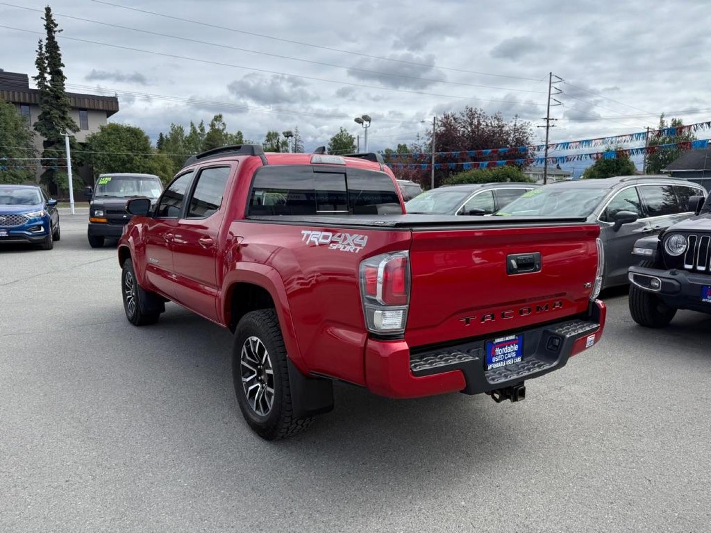 2021 RED TOYOTA TACOMA DOUBLE CAB (3TMCZ5AN6MM) with an 3.5L engine, Automatic transmission, located at 929 East 8th Ave, Anchorage, AK, 99501, (907) 274-2277, 61.214783, -149.866074 - Photo#2