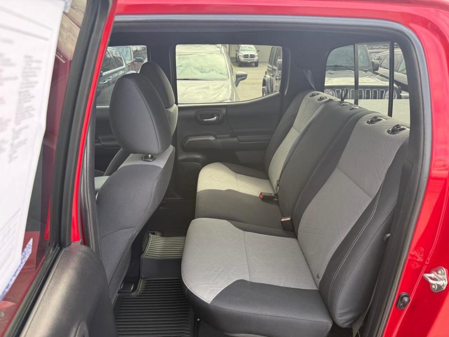 2021 RED TOYOTA TACOMA DOUBLE CAB (3TMCZ5AN6MM) with an 3.5L engine, Automatic transmission, located at 929 East 8th Ave, Anchorage, AK, 99501, (907) 274-2277, 61.214783, -149.866074 - Photo#3