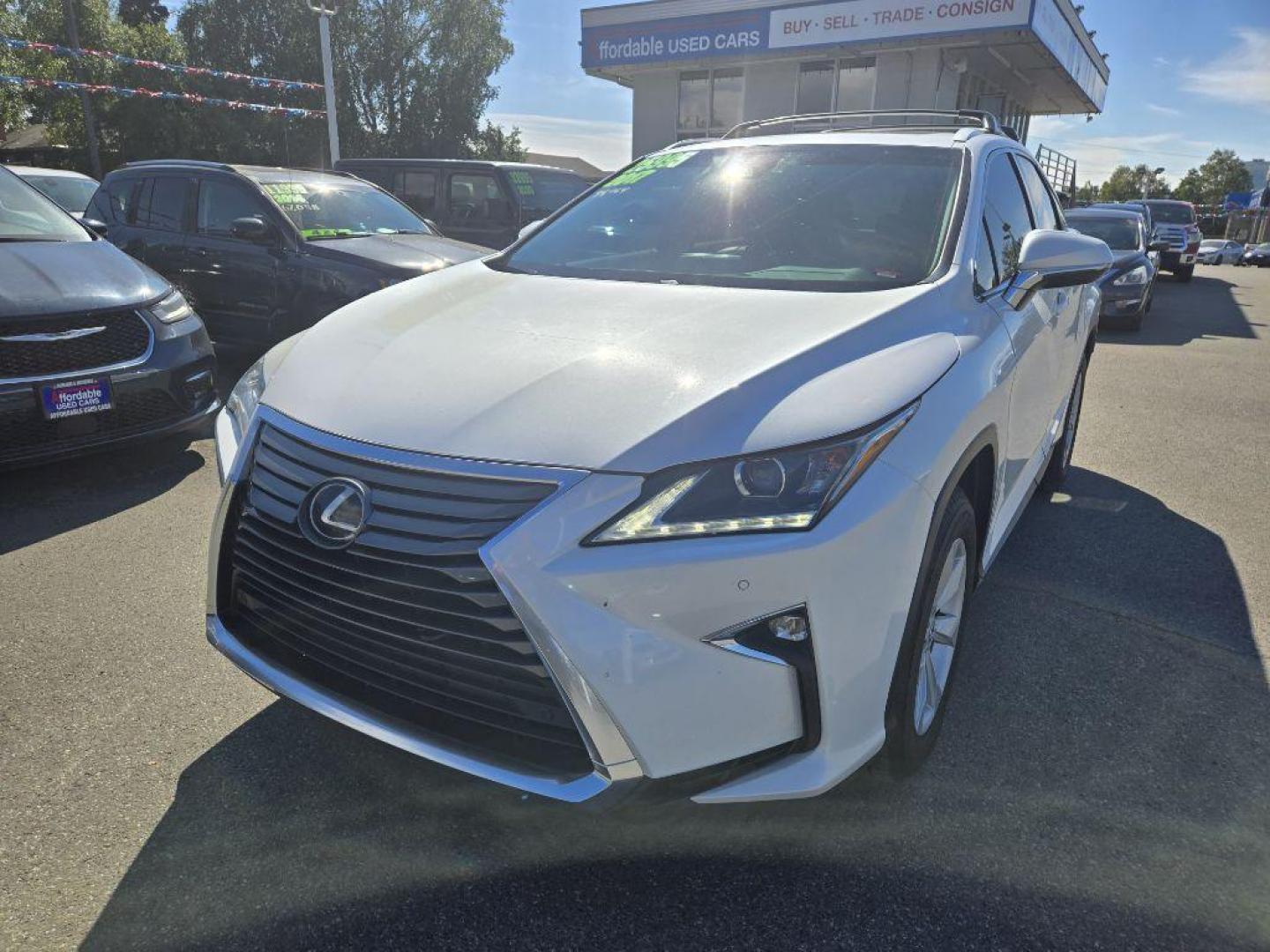2017 WHITE LEXUS RX 350 BASE (2T2BZMCA9HC) with an 3.5L engine, Automatic transmission, located at 929 East 8th Ave, Anchorage, AK, 99501, (907) 274-2277, 61.214783, -149.866074 - Photo#0